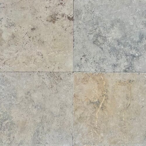 The surface of an antique travertine tile