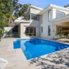 ivory travertine tiles pool area