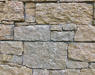 Brown rock wall, feature walls melbourne, stone wall cladding