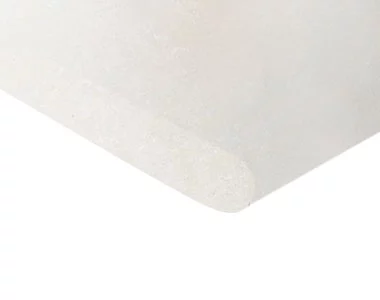 Image of white limestone pool coping tiles in bullnose