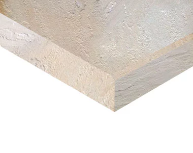 Sandstone pool coping with a square tumbled edge