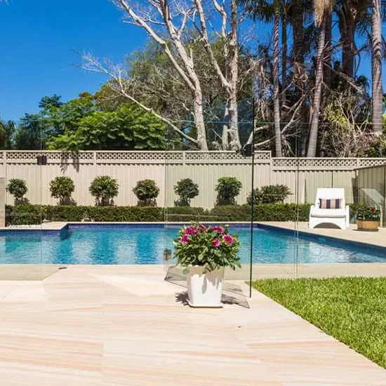 A picture of sandstone pavers around a pool in Melbourne.