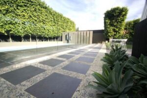 Bluestone Pavers shown as stepping stone format for this outdoor pathway