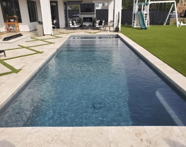 premium ivory travertine tiles around a pool