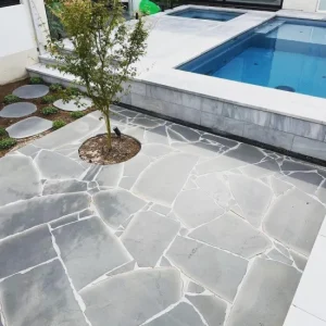 A picture of australian bluestone crazy paving around a pool in Melbourne.